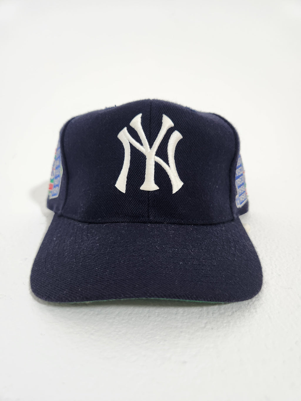 NEW YORK YANKEES VINTAGE 1999 WORLD SERIES CHAMPIONS SNAPBACK ADULT HAT