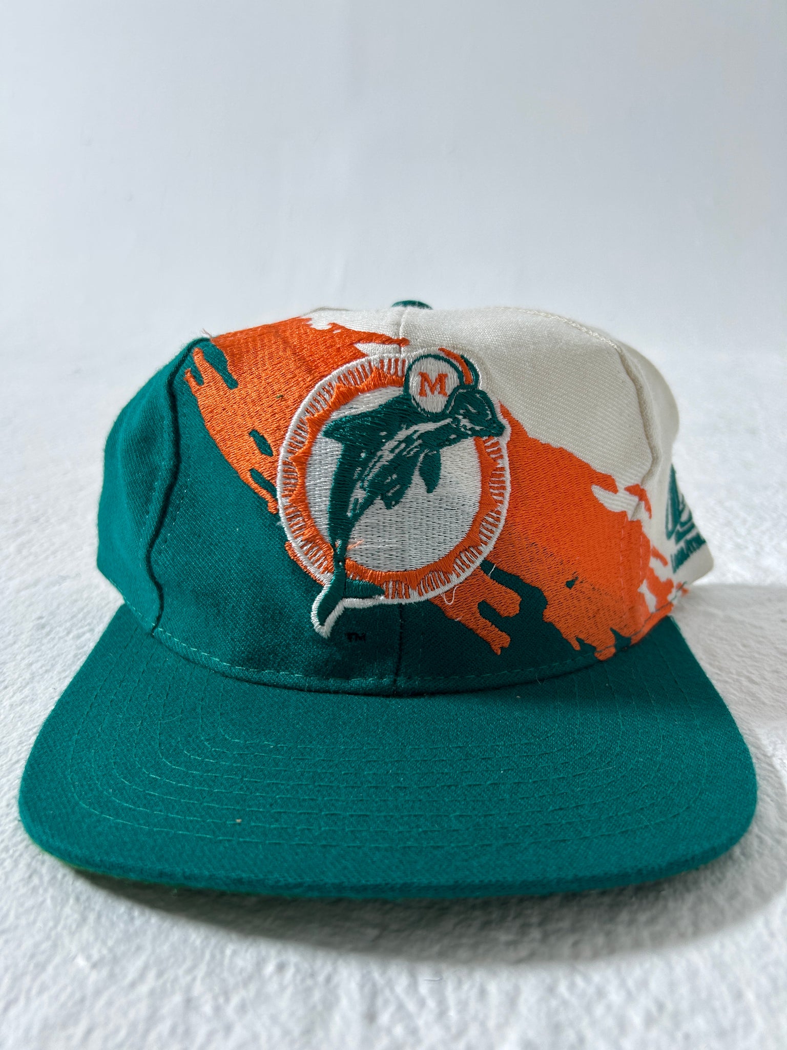 Miami Dolphins Splash Logo offers Athletic Snapback