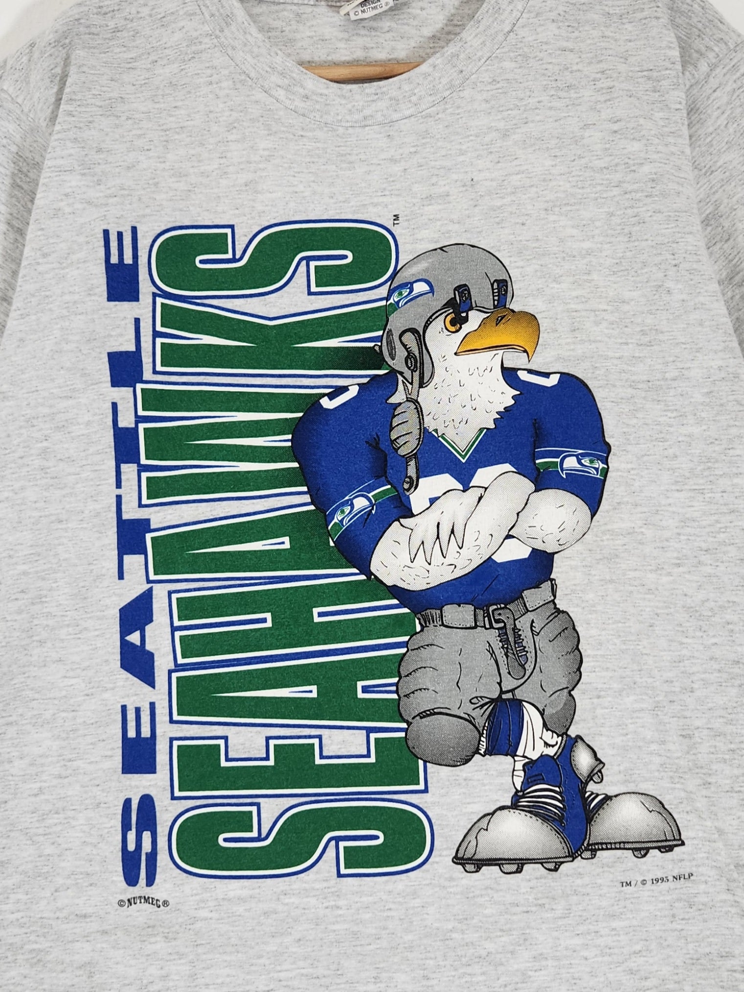 Vintage 1990s NFL Seattle Seahawks Nutmeg Character T-Shirt Sz. L